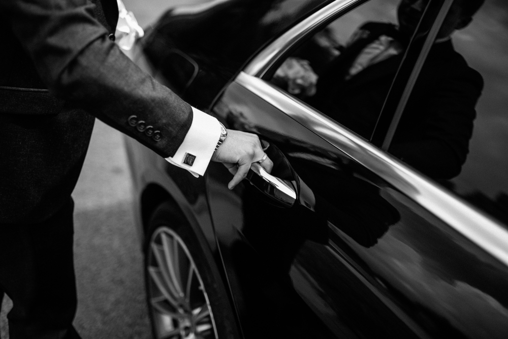 Hand,On,Handle.,Close-up,Of,Asian,Man,Hand,Opening
